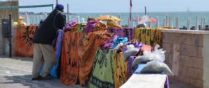 Una spiaggia senza “Vucumprà”? Esiste, ma solo in Romagna. Ecco perché