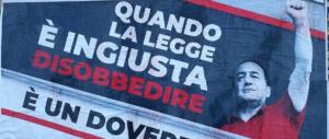 Tweet provocatorio di Meloni: Raggi, lo rimuovi o no questo manifesto?