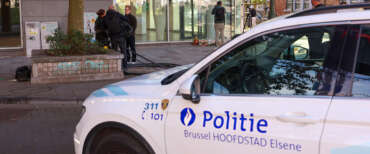 epa10923485 Police at the bank branch, where two football supporters from Sweden were shot dead in a terror attack in Brussels, Belgium, 17 October 2023. A man, suspected of killing two Swedish football supporters on 16 October, was shot by the Police during an operation and has died, Belgian Police said. Following the incident, the Brussels Capital Region has increased its terror threat to level 4, the highest, the National Crisis Center announced. EPA/OLIVIER HOSLET epa10923485 Police at the bank branch, where two football supporters from Sweden were shot dead in a terror attack in Brussels, Belgium, 17 October 2023. A man, suspected of killing two Swedish football supporters on 16 October, was shot by the Police during an operation and has died, Belgian Police said. Following the incident, the Brussels Capital Region has increased its terror threat to level 4, the highest, the National Crisis Center announced. EPA/OLIVIER HOSLET