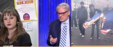 L’attivista che ha bruciato la foto della Meloni in studio da Del Debbio fa una figura barbina (video)