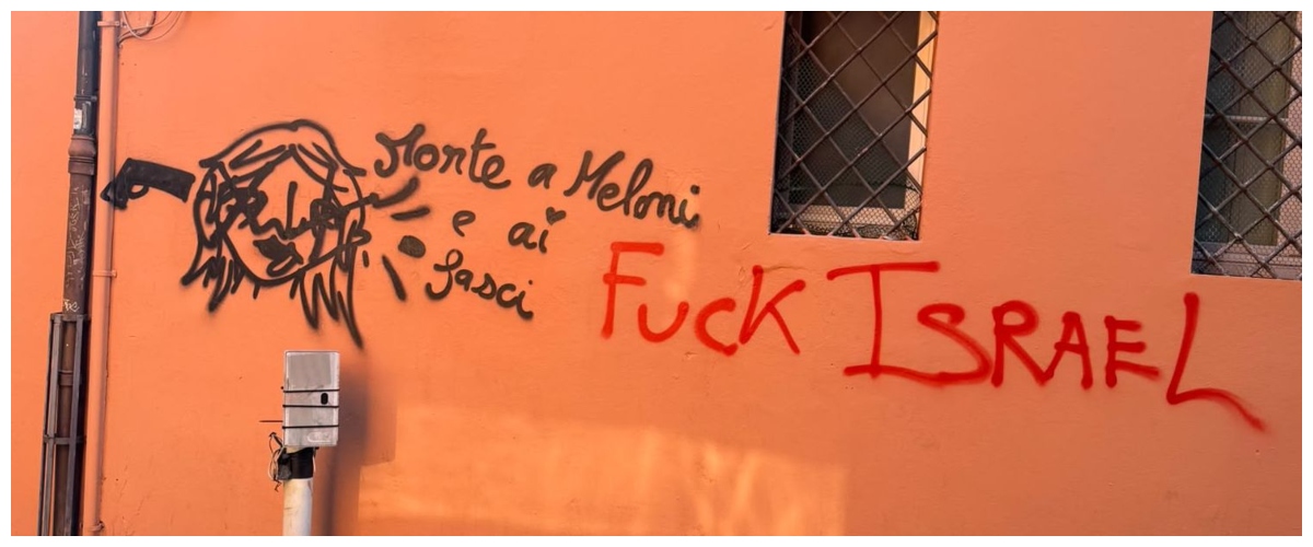 “Morte a Meloni e ai fasci”, la premier disegnata con una pistola sulla tempia a Bologna. Bignami: “Clima di odio alimentato dalla sinistra”